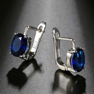 NWOT sterling silver blue zirconium earrings